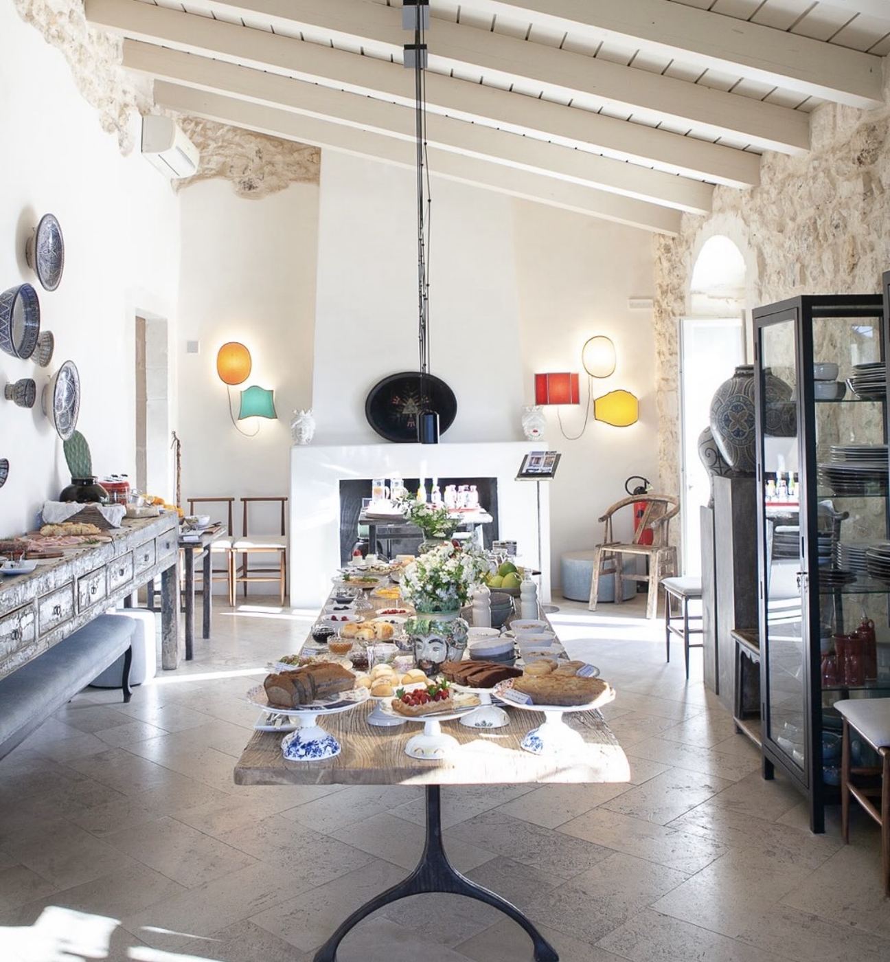 Breakfast table in a restored Sicilian interior