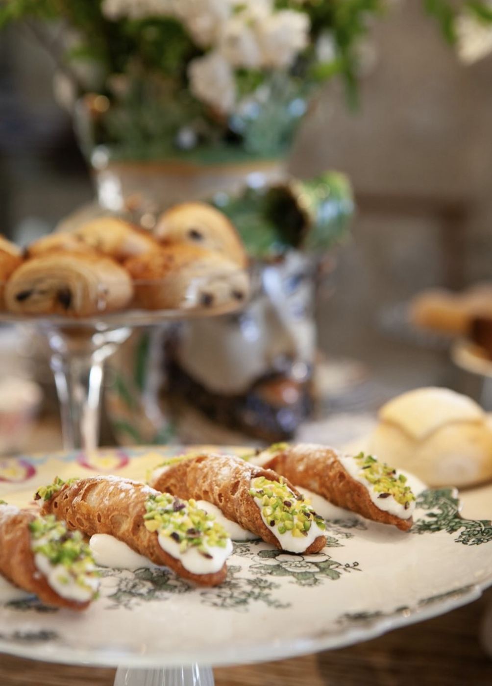 Cannoli on a porcelain stand